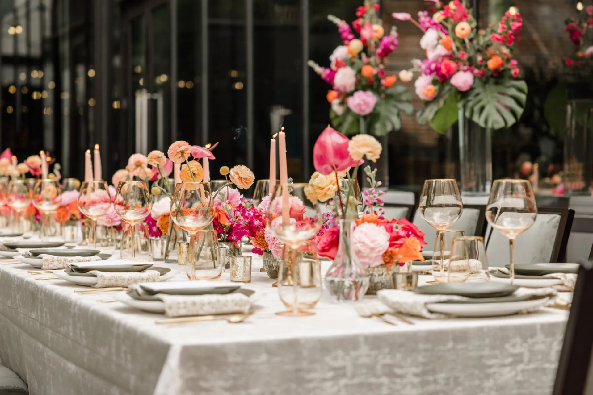 Esther's Feast — candlelit tablescape with olive greenery